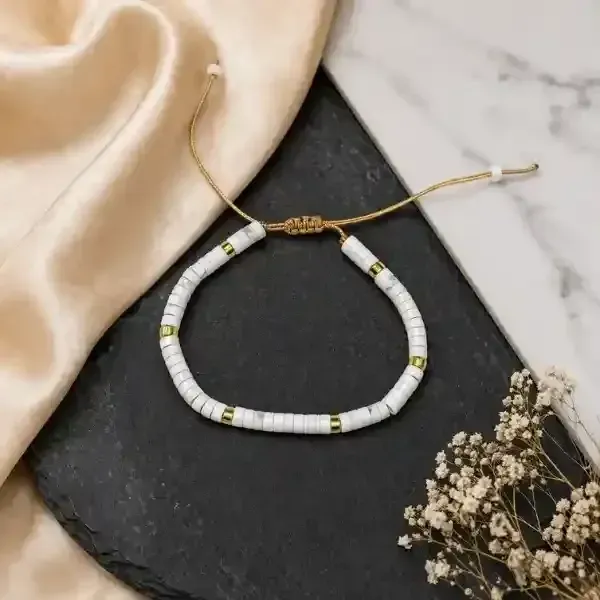 White turquoise disc bracelet worn on wrist natural stone tan macrame — Suyagya India